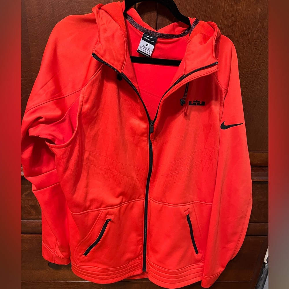 Orange hooded Nike jacket